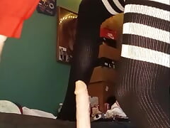 Cross sitting on fuck machine
