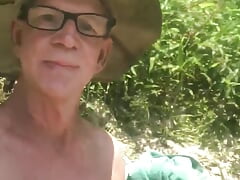Naked in public park river