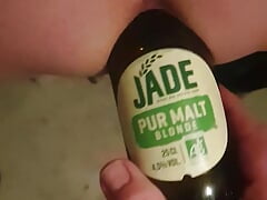 Bottle in the ass